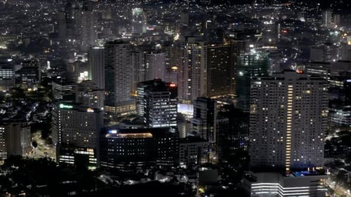 Tall buildings in Cebu city at night, Philippines