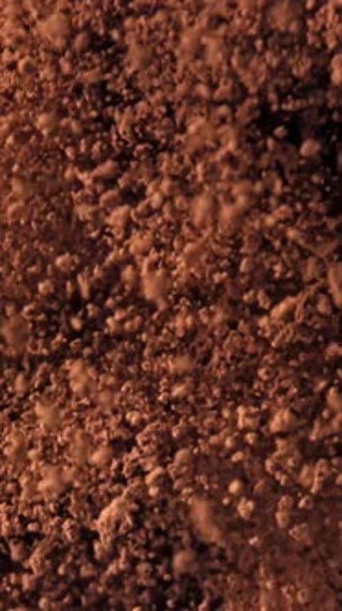 The Cocoa Powder Flies Up and Down Filmed on a Highspeed Camera at 1000 Fps
