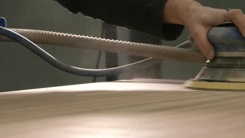 Close-up polishing of wooden board