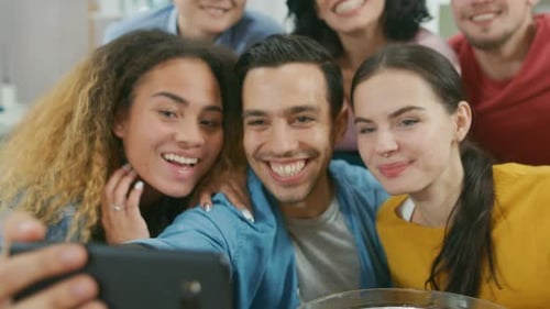 At Home Diverse Group of Friends Doing Collective Video Stream, Guy Lifts Camera. People Smile, Lau