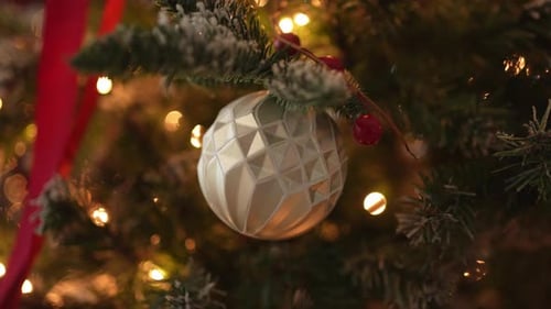 Sparkling Christmas Tree Ornament and Lights Close-up