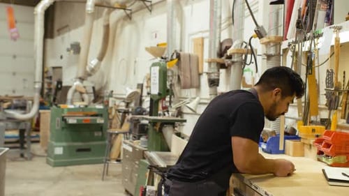 Man works on a project in workshop