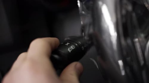 Hand Operates Car Light and Wiper Controls