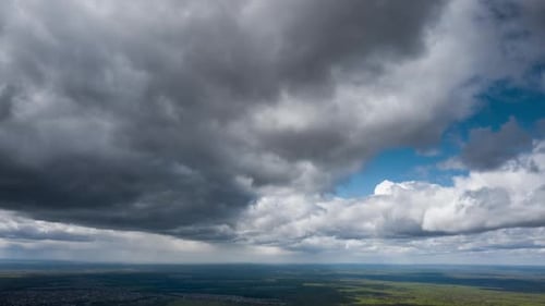 Aerial high altutude timelapse of the sky with clouds