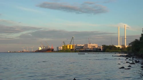 Wind turbinesvnad industrial facility on the shores of Aalborg