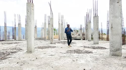 African engineer inspector surveillance operating drone pilot. Drone pilot engineer uav copter techn