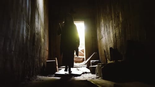 Eerie Masked Figure Walks Dark Stone Corridor