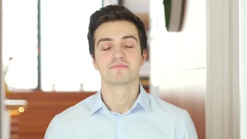 Close Up of Young Adult Talking Indoors