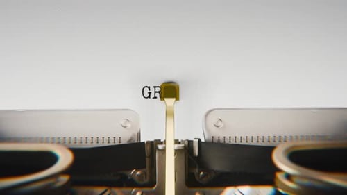 Old mechanical typewriter typing Growth in a close-up view.