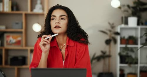 Woman Working at Laptop in Modern Home Office