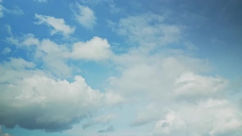 Clouds Floating Across a Blue Sky