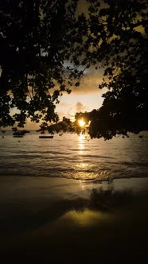 Sunset Over a Tranquil Bay with Boats Seychelles Mahe