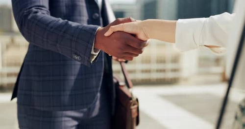 Business people, shaking hands and travel in city for b2b partnership, outdoor deal and meeting