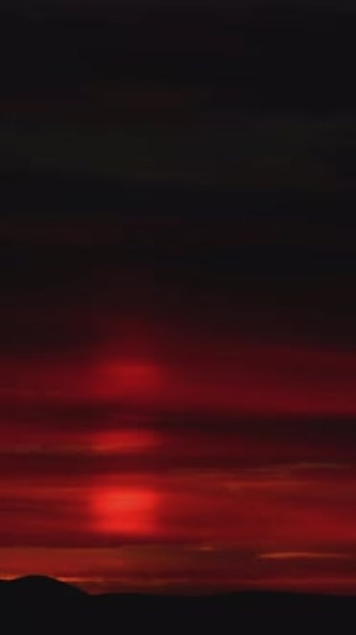 Vibrant Sunset Time Lapse Over Rolling Hills