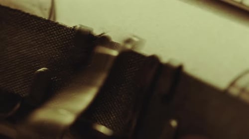 Printing Love Story on Paper with Vintage Typewriter