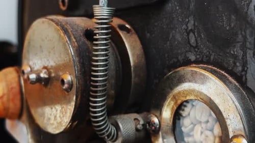 Roasting Coffee Beans in Industrial Machine Close Up