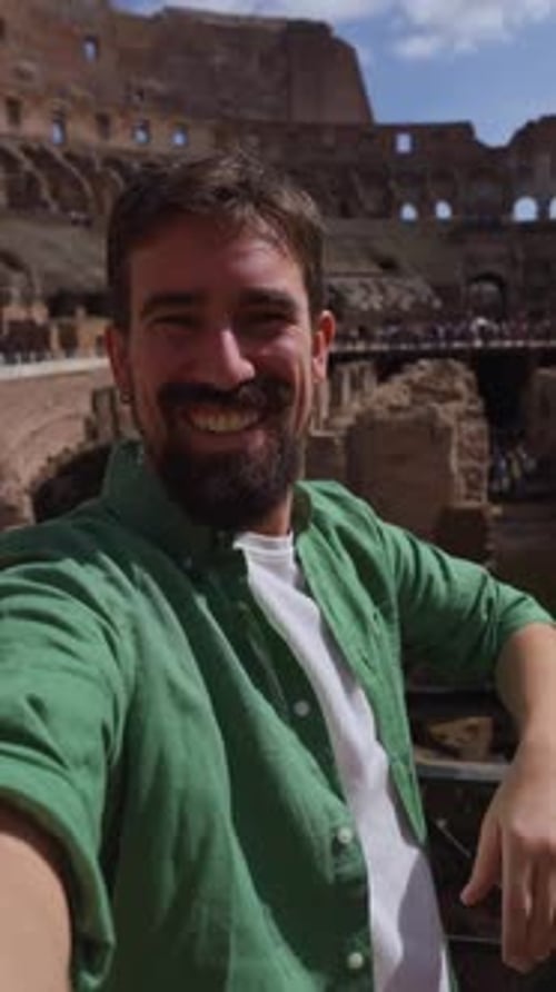 Tourist Taking Selfie at the Colosseum in Rome Italy