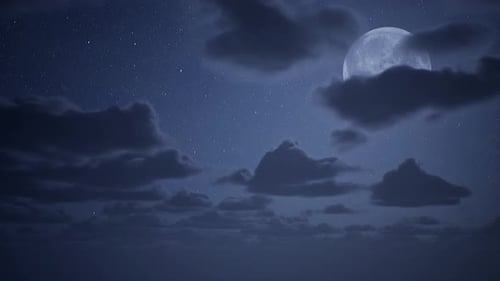 Full Moon Shines in Starry Night Sky