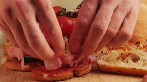 Ham Appetizers Being Prepared for Consumption