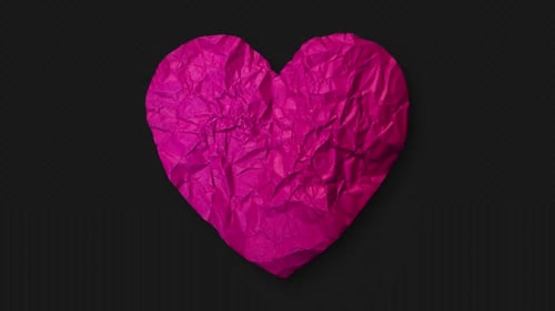 Unfolding Crumpled Pink Paper Heart Reveal Animation
