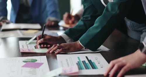 Boardroom, hands and colleagues with documents, graphs and review of financial report