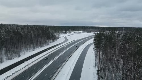 Aerial View of Winter Highway A Stunning and Beautiful Snowy Landscape Showcasing Scenic Roads and