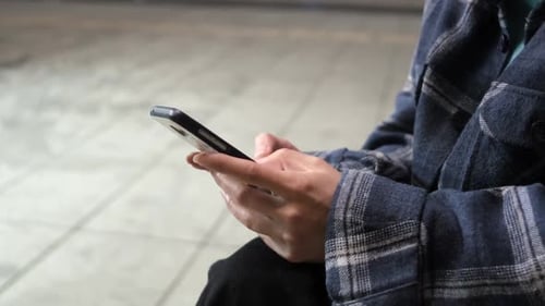 Close Up of Person Using a Smartphone