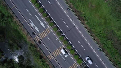 Freeway,Highway or Motorway with traffic on sunny clear day with all types of motor vehicles. Top do