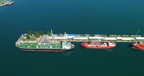 Cargo Ships Moored to the Pier