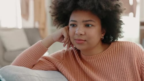 Woman Talking to Friend in Cozy Living Room