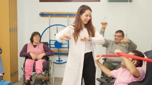 Rehabilitation Center: People Exercising with Resistance Bands