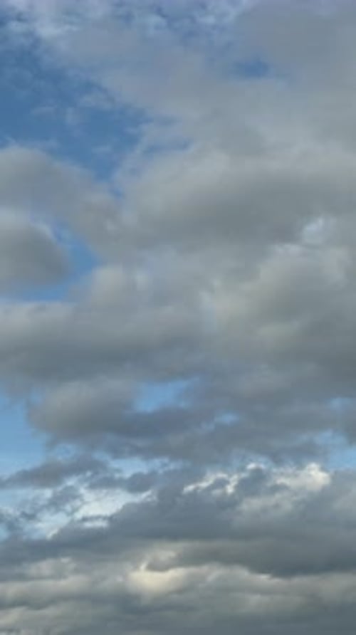 Clouds Drifting in a Blue Sky on a Sunny Day