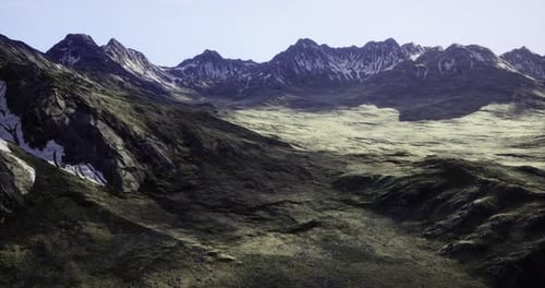 Majestic Mountain Landscape with Rugged Terrain and Snow Capped Peaks