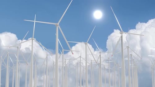 Windturbinen am sonnigen Himmel