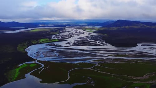 Aerial View of Braided Glacial River on Volcanic Plain in Iceland