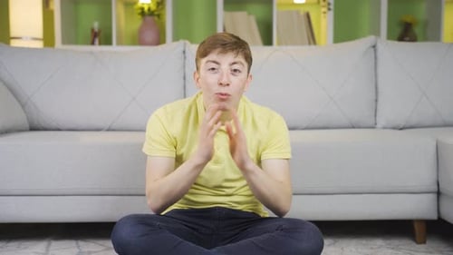 Young Adult Talking and Using Hand Gestures