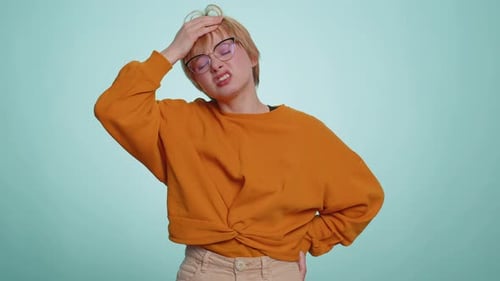 Young Woman Coughing, Showing Symptoms of Illness