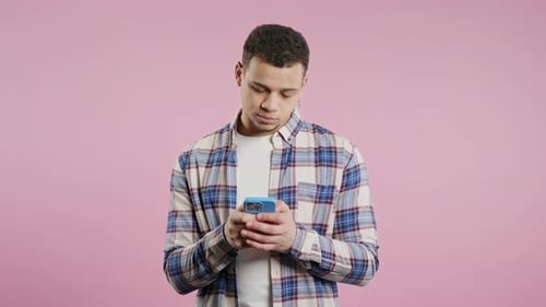 Handsome Man Surfing Internet On Smartphone Guy Using Social Networks Chatting