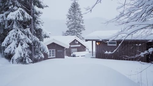 Cabins In Forest Woods Covered In Snow During Winter In Indre Fosen, Norway - wide