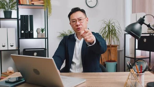 Business Man Working on Office Laptop Pointing to Camera Looking with Happy Expression Making Choice