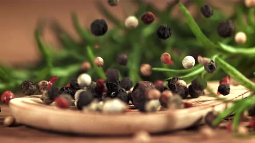 Peppercorn Falls Onto a Spoon Filmed on a Highspeed Camera at 1000 Fps