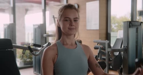 Female Hands Taking Bodybuilding Dumbbells in Gym Club Close Up Woman Hands Taking Weight Lifting in