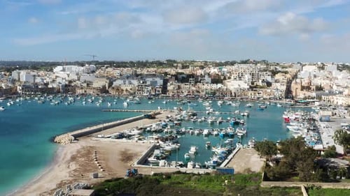 Marsaxlokk Fishing Village In Malta Island In Summer - aerial drone shot