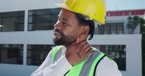 Burnout, tired and African construction worker with neck pain, building stress and accident on site