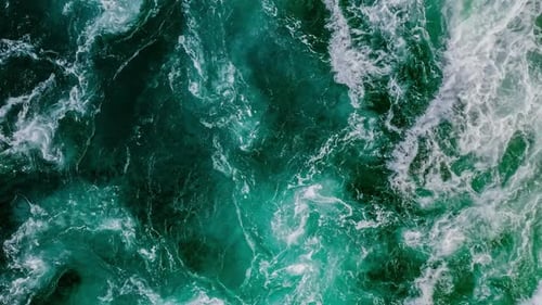Waves of water of the river and the sea meet each other during high tide and low tide.