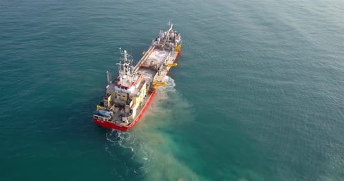 Aerial footage over Sand dredging ship in Mediterranean Sea