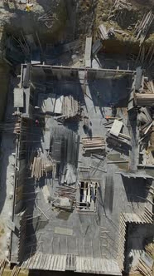 Vertical Video of Engineers Supervising Metal Assembly Work
