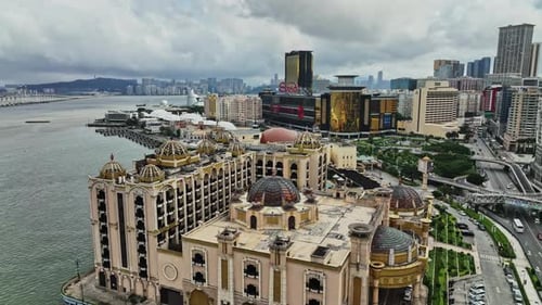 An aerial view of a city with a large body of water