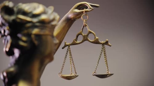 Legal and Law Concept Statue of Lady Justice on Blue Background Move Camera View Footage