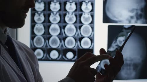 Radiologist Analyzing X-Rays